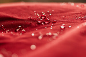 Rain droplets on fabric.